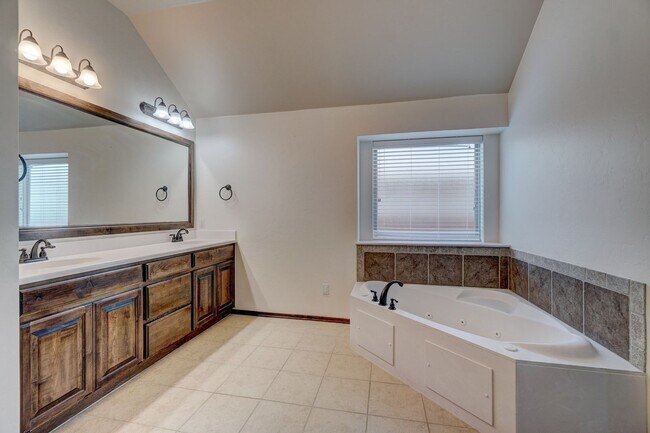 Building Photo - Stunning 4-Bedroom Home with Fireplace, Island Kitchen, 3-Car Garage & Large Backyard!