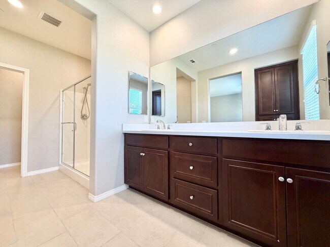 Building Photo - Move-In Ready 2 Bedroom 2.5 Bathroom Condo with LOFT & 2 Car Garage