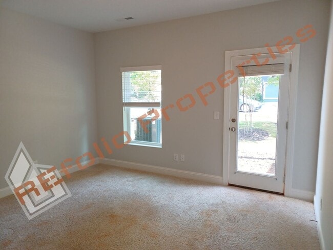 Building Photo - Built in 2022! 3 Story 3 Bedroom 1-Car Gar...