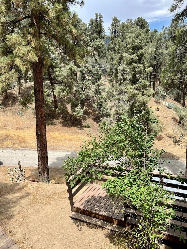Building Photo - Cozy 3-Bed 2-Bath Cabin-Style Home Nestled...