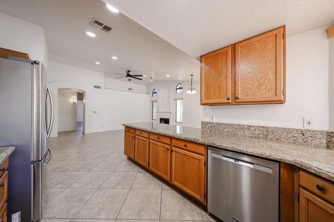 Building Photo - Welcome to this stunning 4-bedroom, 2-bath...