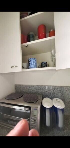 More glasses and cups over cooking area - 45-217 Lilipuna Rd