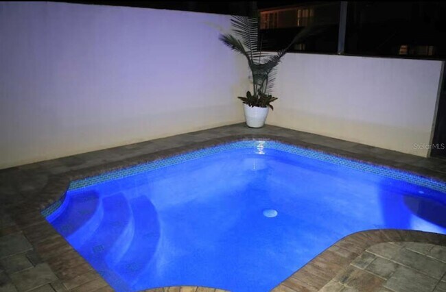 Building Photo - 8117 Princess Palm Ln