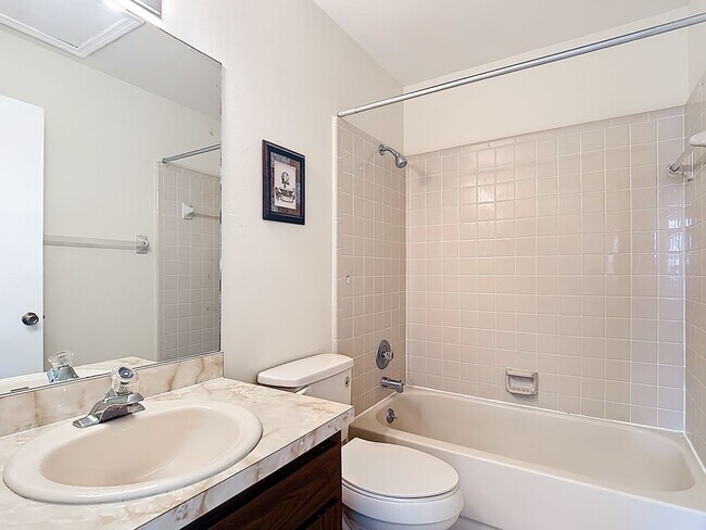 Building Photo - Spanish-Style 3 Bedroom, 2.5 Bath Mediterranean Rooftop Townhouse – Basic Cable & Wi-Fi Included!