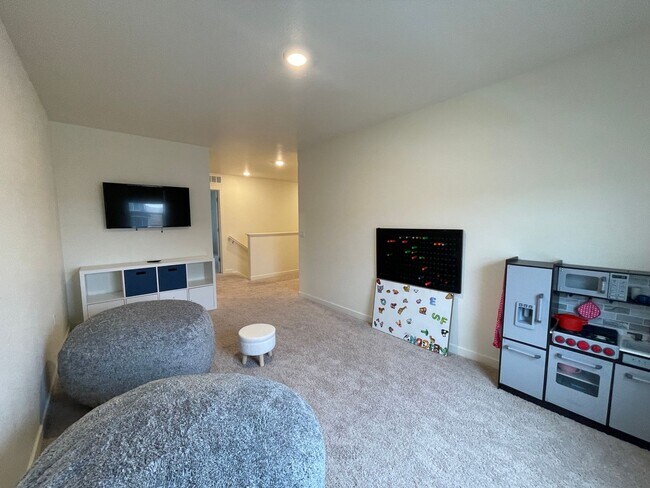 Building Photo - Live Lavishly in Harmony Ridge- Fully Furnished 5-Bedroom Dream Home with Backyard Oasis & Speake...
