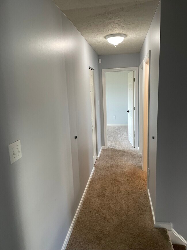 Upstairs Hallway - 104 Pine Creek Dr