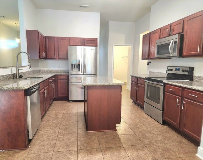 Building Photo - Welcome to your 4/2 dream home in Pace Mil...