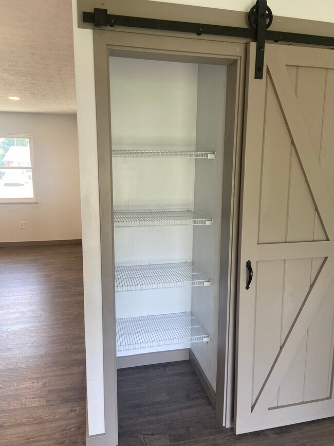 Barn door pantry off of the kitchen - 174 Brisbane Ave