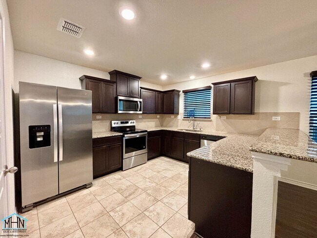 Building Photo - Welcome and Discover this thoughtfully des...