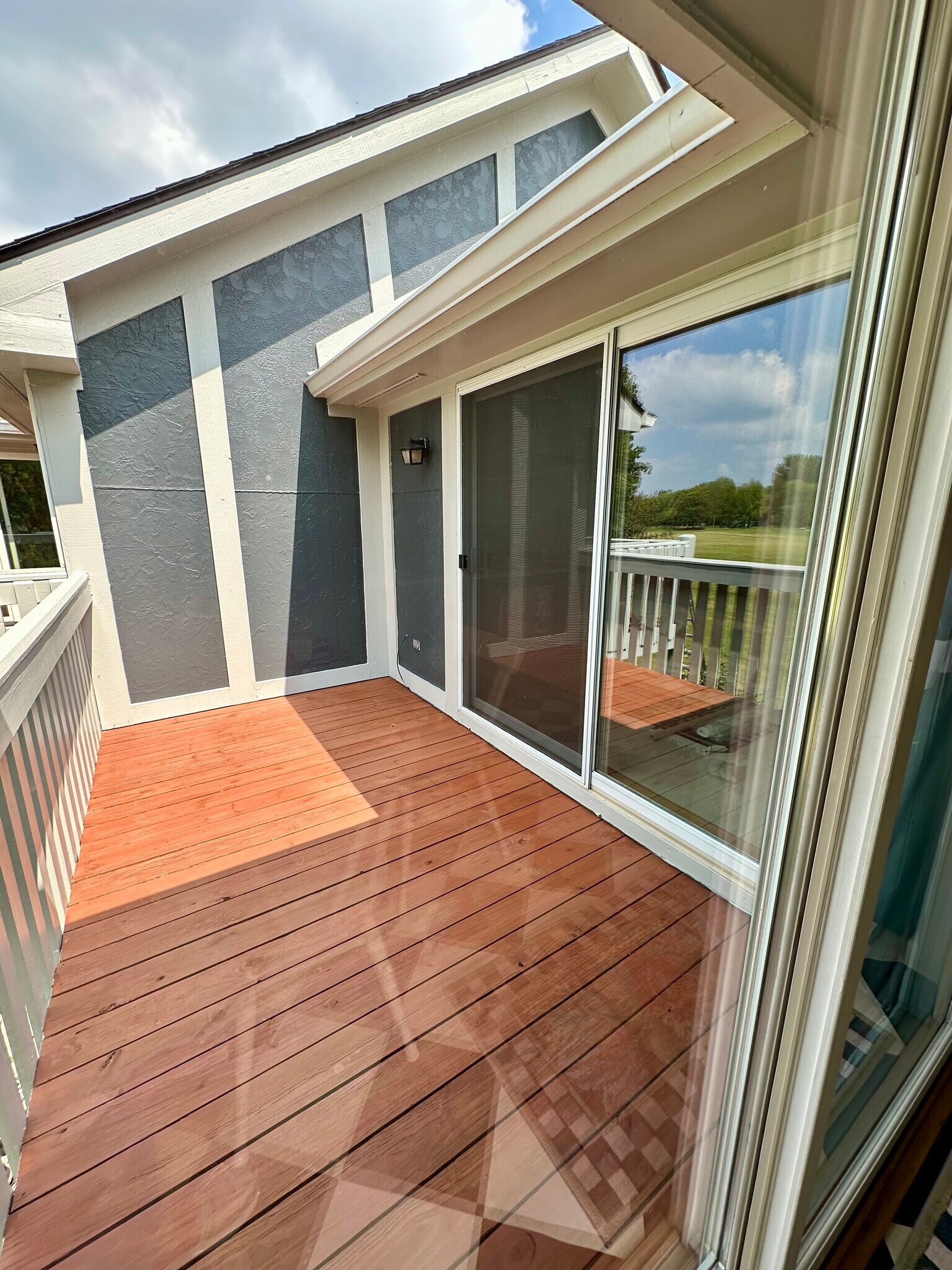 Marvin patio doors. Newly painted exterior and stained balcony boards - 174 Hemingway Ct
