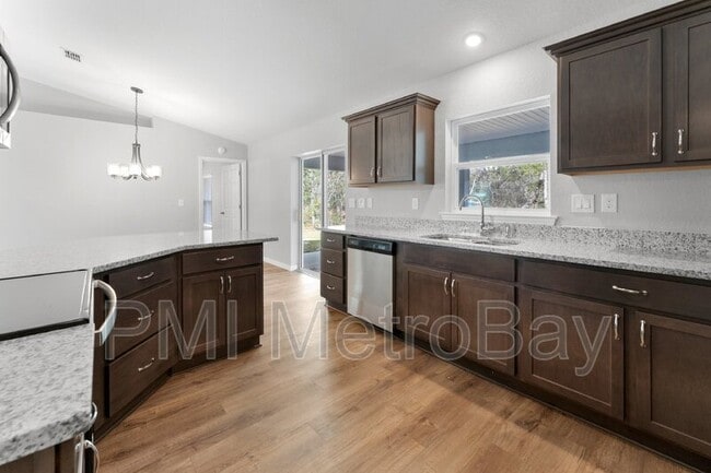 Building Photo - 9461 N Sandree Dr