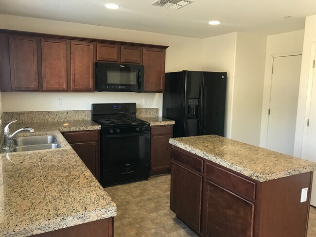 Building Photo - Now Available – 4 Bedroom Home with Loft i...