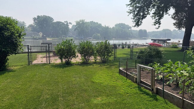 Building Photo - Riverfront Living on the Fox: 2 Bed, 1 Bath with Private Dock and Oversized Garage