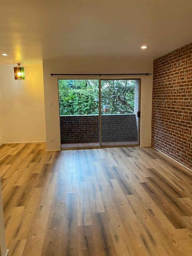 living room view of porch - 120 S Maple Dr