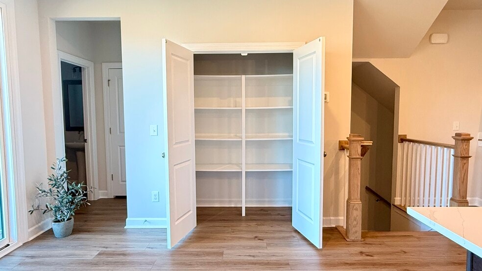 Oversize pantry with full-height shelving. - 4720 Cypress Tree Ln