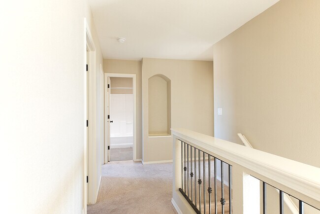 Building Photo - Beautiful 4-Bedroom Home with Custom Backy...