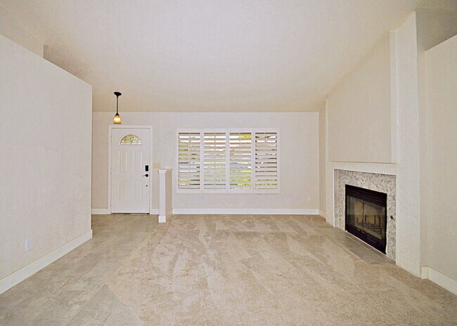 Building Photo - "Charming Oasis: 3-Bedroom Cathedral City Retreat with Pool, Fireplace, and Granite Kitchen!"