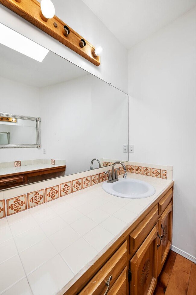 Building Photo - NEW MOVE-IN SPECIAL! Vibrant Home Off Rode...