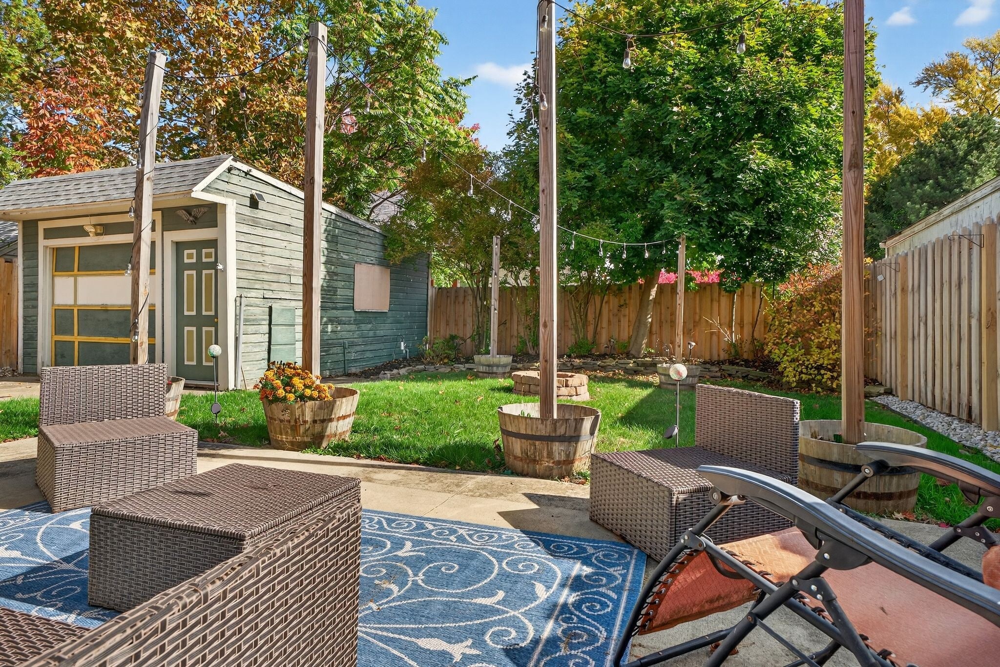Backyard with Fenced in Yard and String Lights - 4429 S Hills Dr