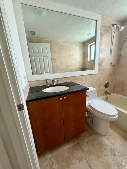 bathroom with brand new toilet. - 1353 Holly Heights Dr