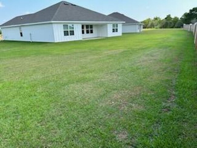 Building Photo - 4BR/2BA Gulf Shores home with community pool