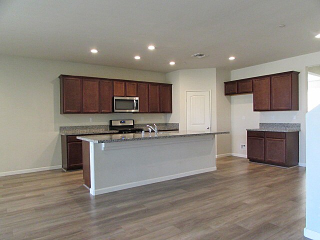 Building Photo - Spacious 5-Bedroom Home with Loft, Solar P...