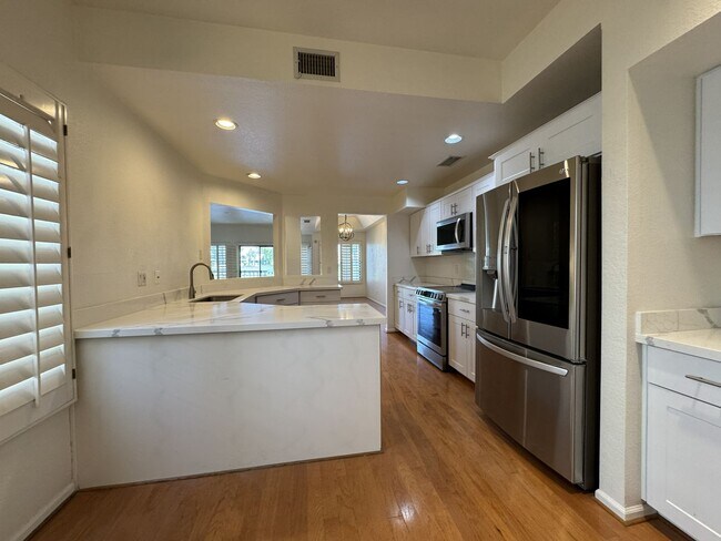 Building Photo - LUXURY LAKEFRONT GAINEY RANCH TOWNHOME WITH GOLF COURSE VIEWS – RESORT STYLE SCOTTSDALE LIVING!