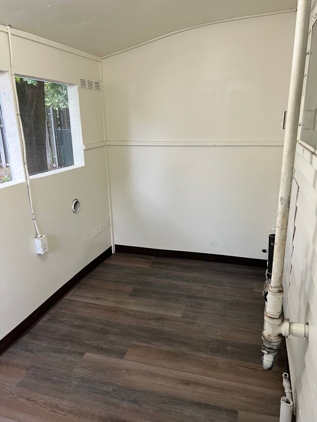 Building Photo - Small 2 bedroom home with carport
