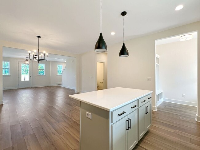 Building Photo - Beautiful, 3-Bedroom Midtown Nexton Townhome with Garage & Amenities