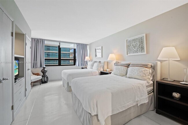 Building Photo - 10205 Collins Ave
