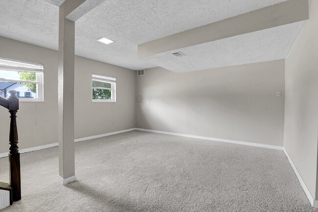 Building Photo - $2,720.95 - 4 bed, 2 bath, located in Aurora with attached Garage and In Unit Washer and Dryer!