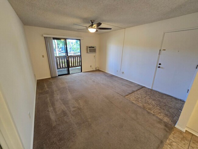 Building Photo - Freshly Painted 1-Bedroom Condo with Covered Parking