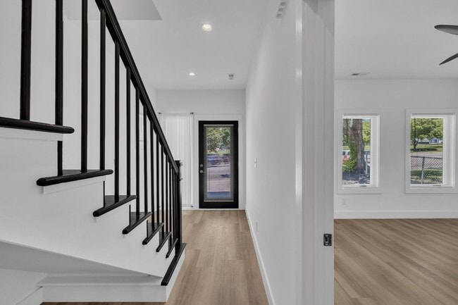Building Photo - Modern New Construction Townhome with Roof...