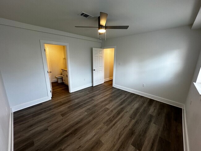 Primary Bedroom looking at hallway/en suite bathroom - 3300 Nashville Ave