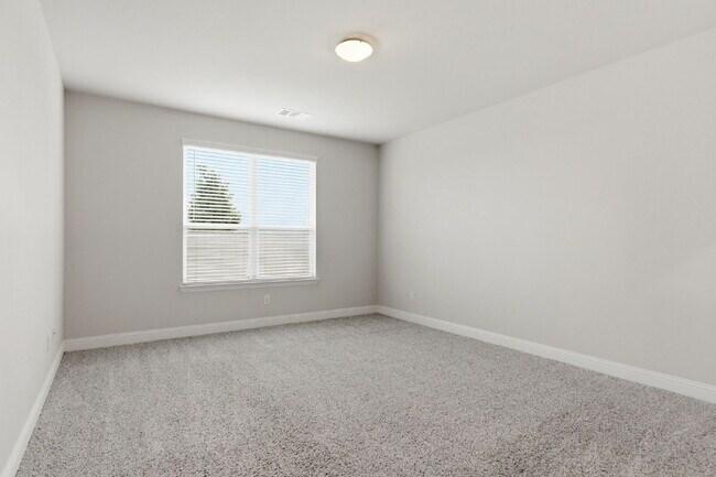Building Photo - "Open-Concept 4-Bedroom, 2.5-Bath with Designer Finishes and Peaceful Greenbelt Views!"