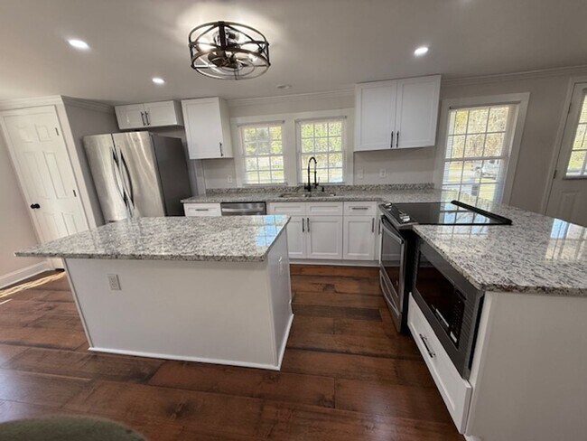 Building Photo - Country Charm Meets Modern Updates