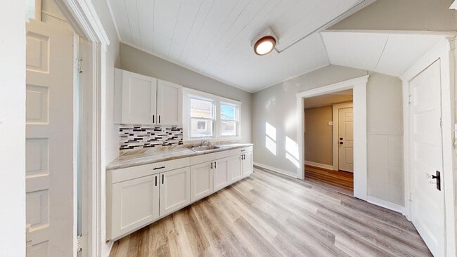 Building Photo - 7408 Dudley Ave