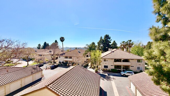 Building Photo - Beautifully Remodeled and Updated Upstairs Condo Unit in the Private & Gated Vista Way Village Co...