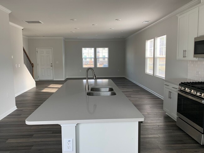 Building Photo - Gorgeous New Construction Townhome! Great ...