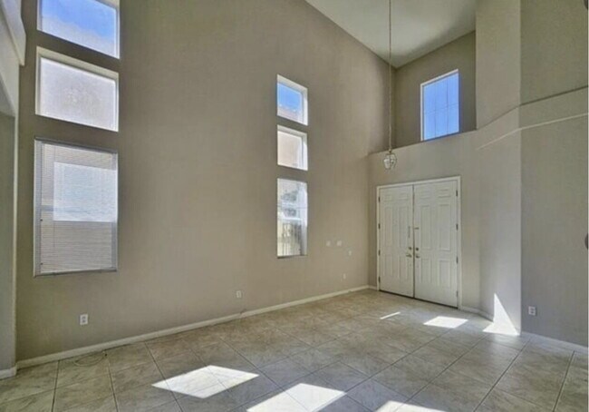 Building Photo - GATED SUMMERLIN HOME | 5 BEDROOM + DOWNSTAIRS DEN | 3-CAR GARAGE