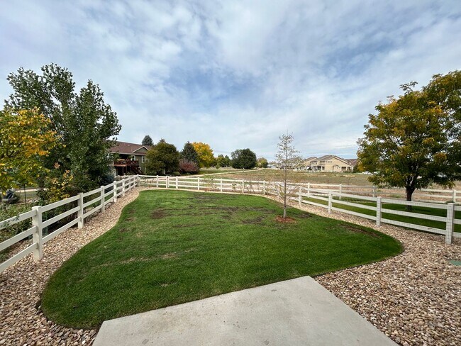 Building Photo - $500 Off First Month Of Rent! Modern 3BR Townhome with Fenced Yard & Garage