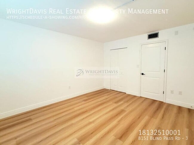 Building Photo - 8151 Blind Pass Rd