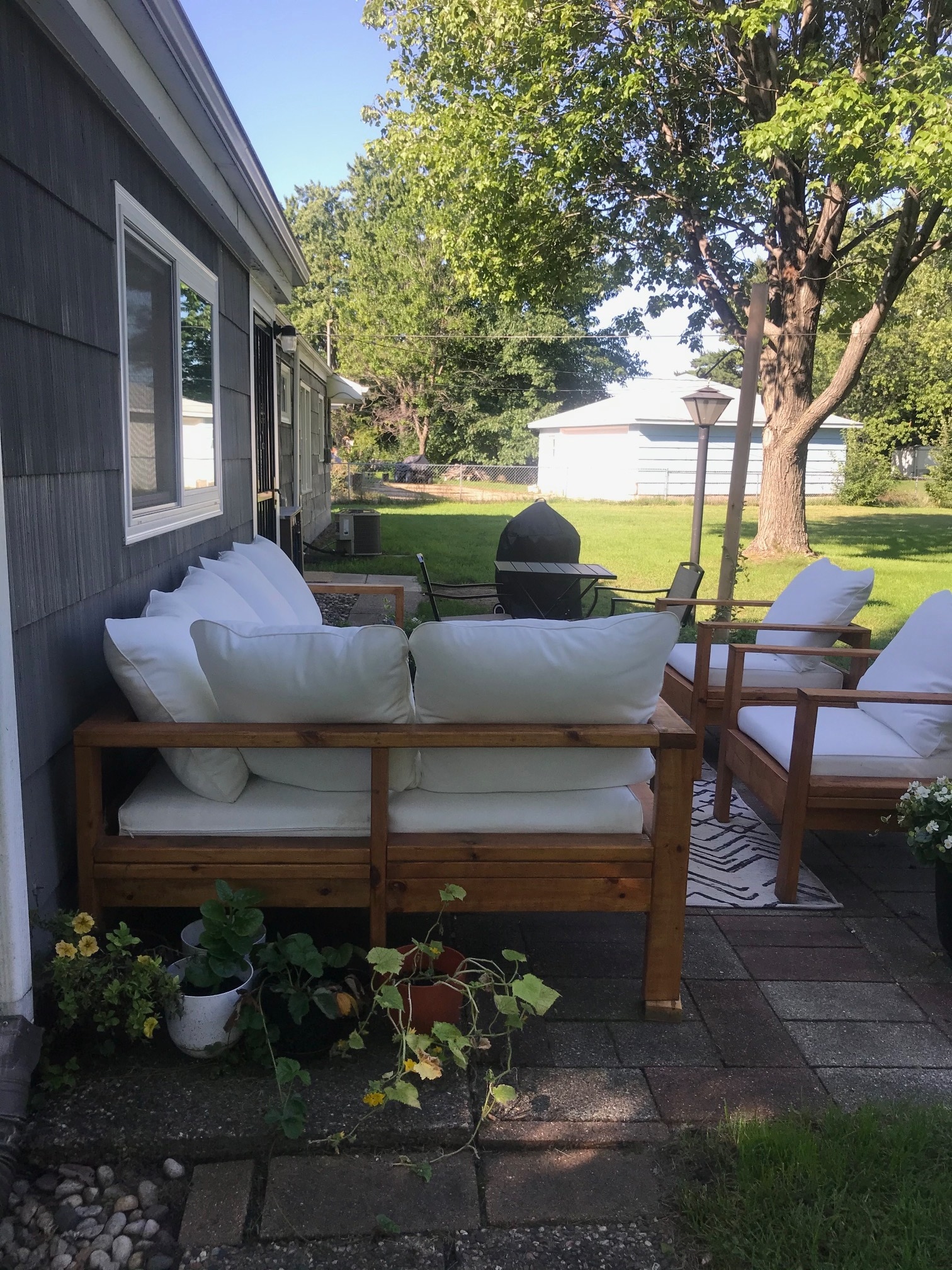 back patio furnished, walkout from bonus room - 1612 E 88th St