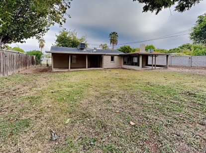 Building Photo - 6557 N 10th Ave