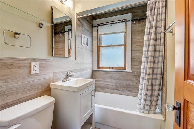 Updated bathroom with tub - 322 E Rosedale Ave