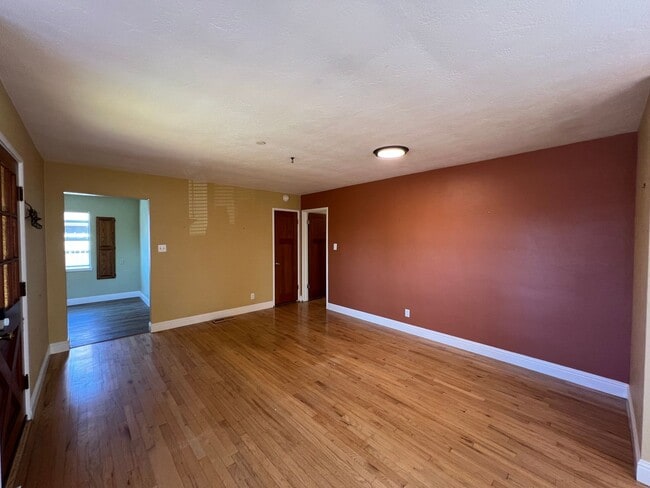 Building Photo - Spacious 4-Bedroom Retreat Just Steps from...