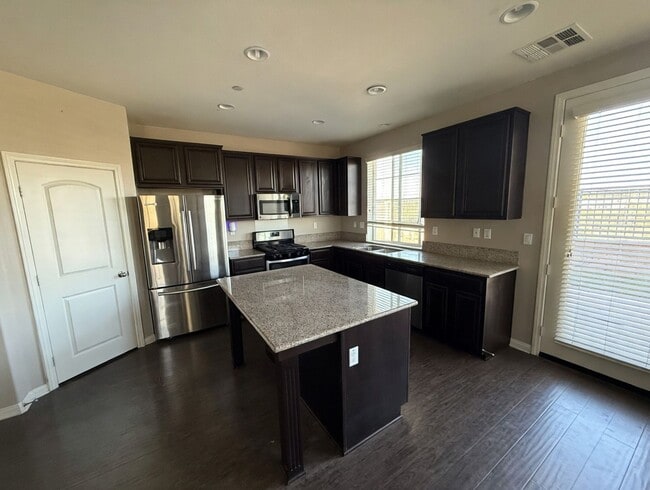 Building Photo - Charming 3BR Home with Modern Kitchen, Versatile Loft, & Private Backyard