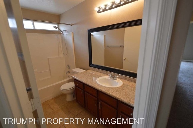 Building Photo - 8820 Spinning Wheel Ave