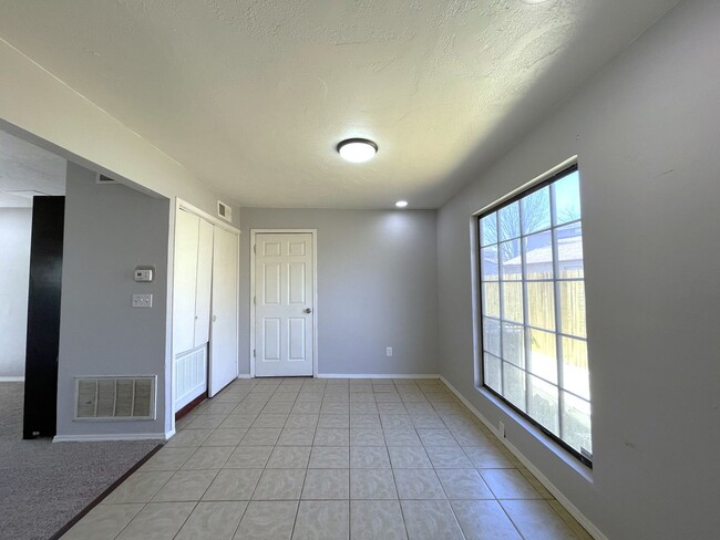 Building Photo - Welcome to this charming two-story single-...