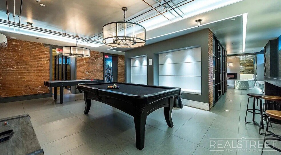 Building Photo - Bright 2 Bed / 1 Bath Loft-Style Residence with Multiple Balconies & Premium Amenities